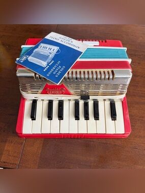 1950s Emenee Golden Piano Accordion
Musical Toy Red & White